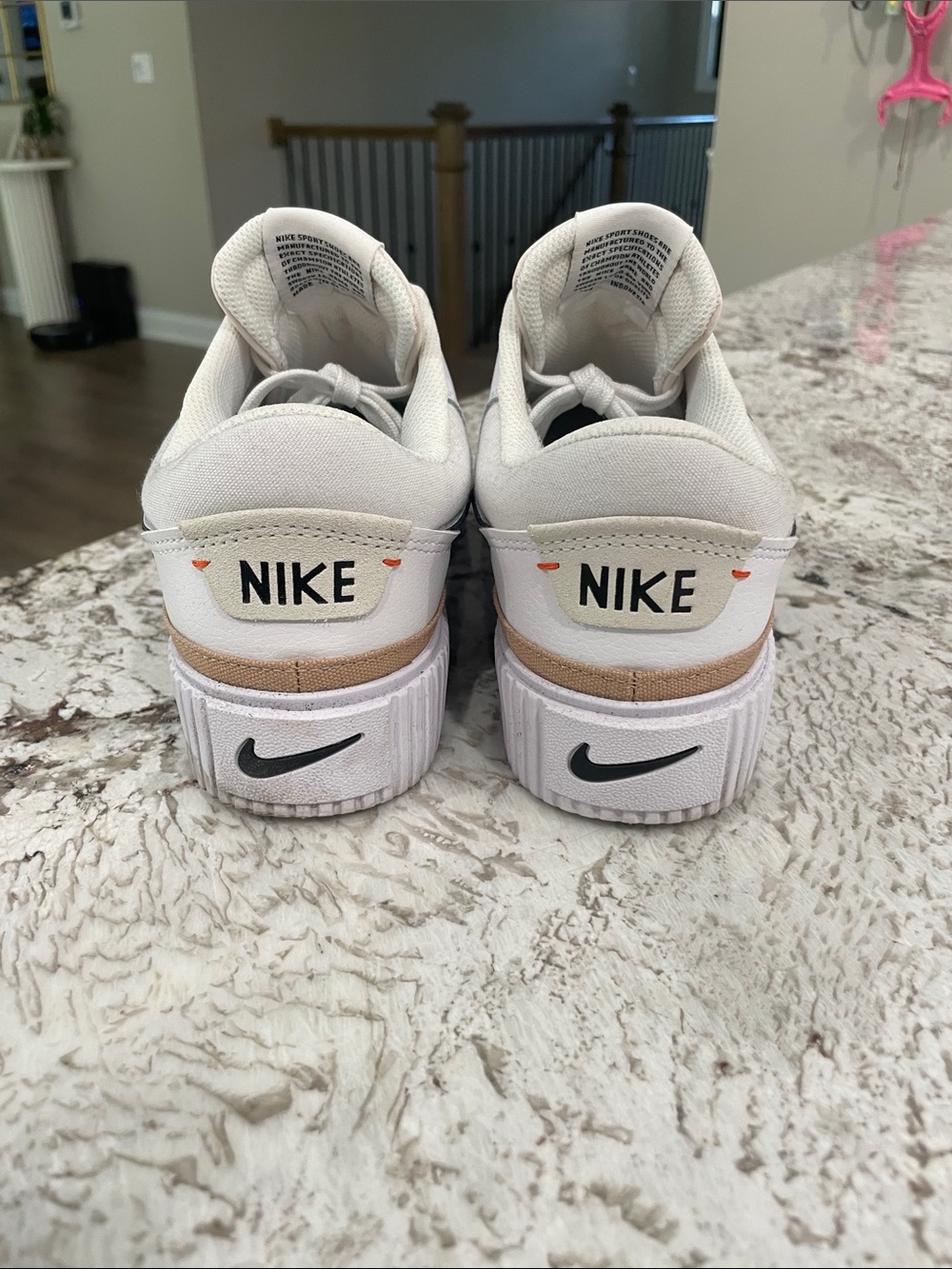 Nike Women's White Sneakers with Black Swoosh and Tan Accent - Picture 2 of 3